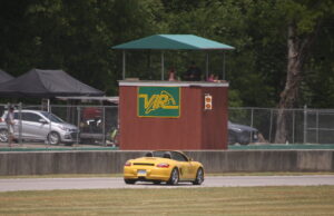 Low-speed "parade" laps in the 987 Boxster S with the top down, and a passenger, during a VIR Club Day