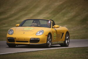 Low-speed "parade" laps in the 987 Boxster S with the top down, and a passenger, during a VIR Club Day